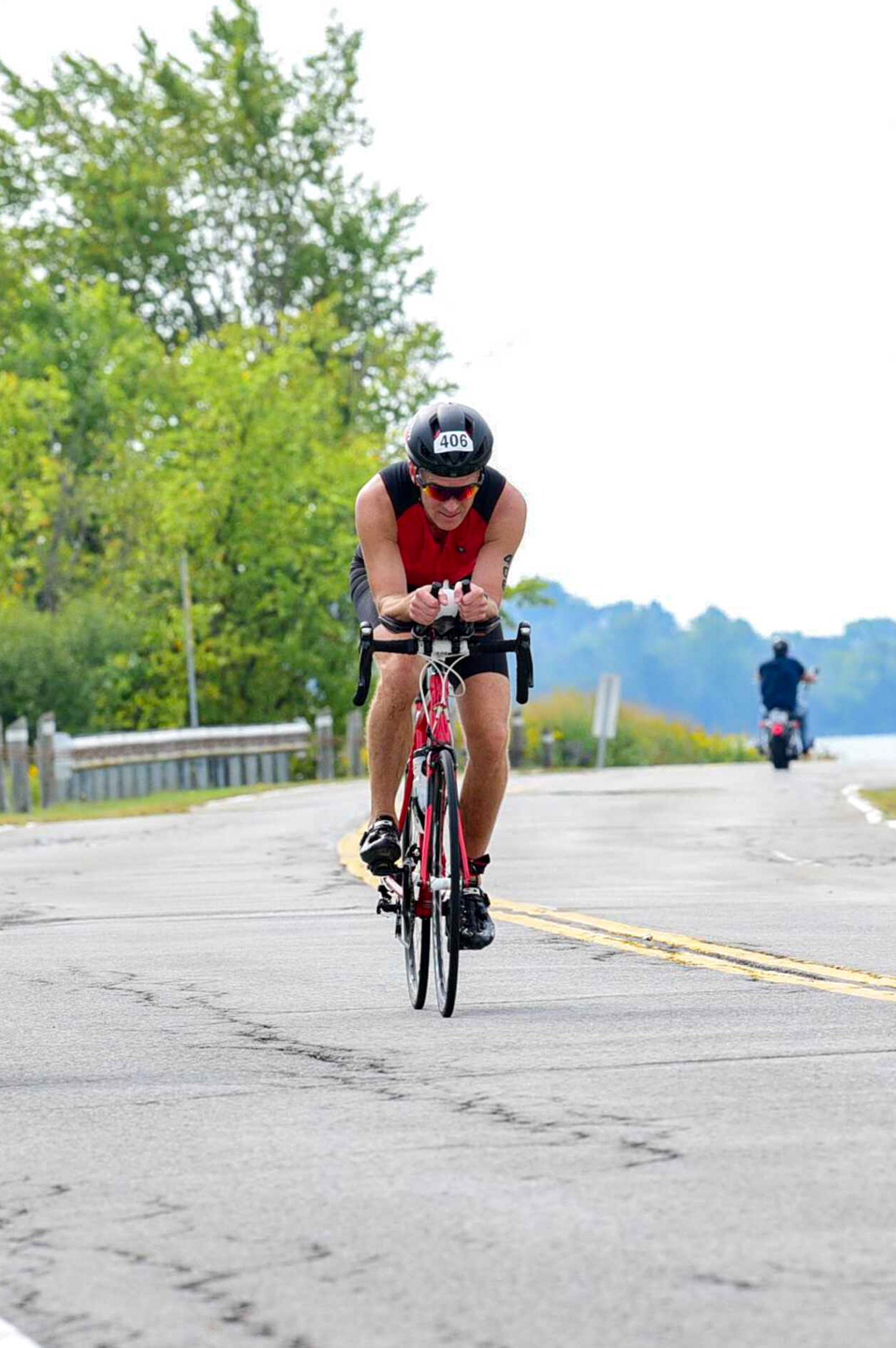 Biking in the aero position at the 2022 Barrelman Niagara Falls